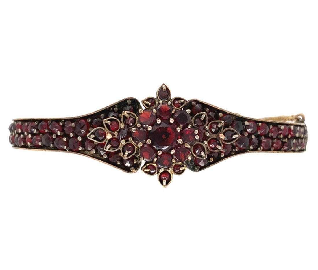 Antique Bohemian Garnet Bangle Bracelet with Rosette Center: Antique Bohemian Garnet Bangle Bracelet with Rosette Center This exquisite Genuine Bohemian Garnet Bangle Bracelet features a stunning rosette center design with a double row of garnets. Crafted from