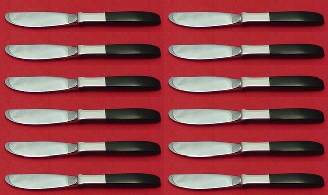 Lunt Contrast Sterling Silver Butter Spreader Set of 12: Lunt Contrast Sterling Silver Butter Spreader Set of 12 Enhance your dining experience with this elegant set of 12 butter spreaders from Lunt's Contrast pattern. Each spreader features a beautiful ste