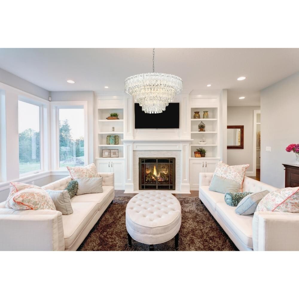 Emilia 10 Light Chrome Chandelier Modern Ceiling Fixture 31 inch: Emilia 10 Light Chrome Chandelier Modern Ceiling Fixture 31 inch Elevate your living space with this stunning 10-Light Crystal Chandelier, designed to add a touch of modern elegance to any room. Featu