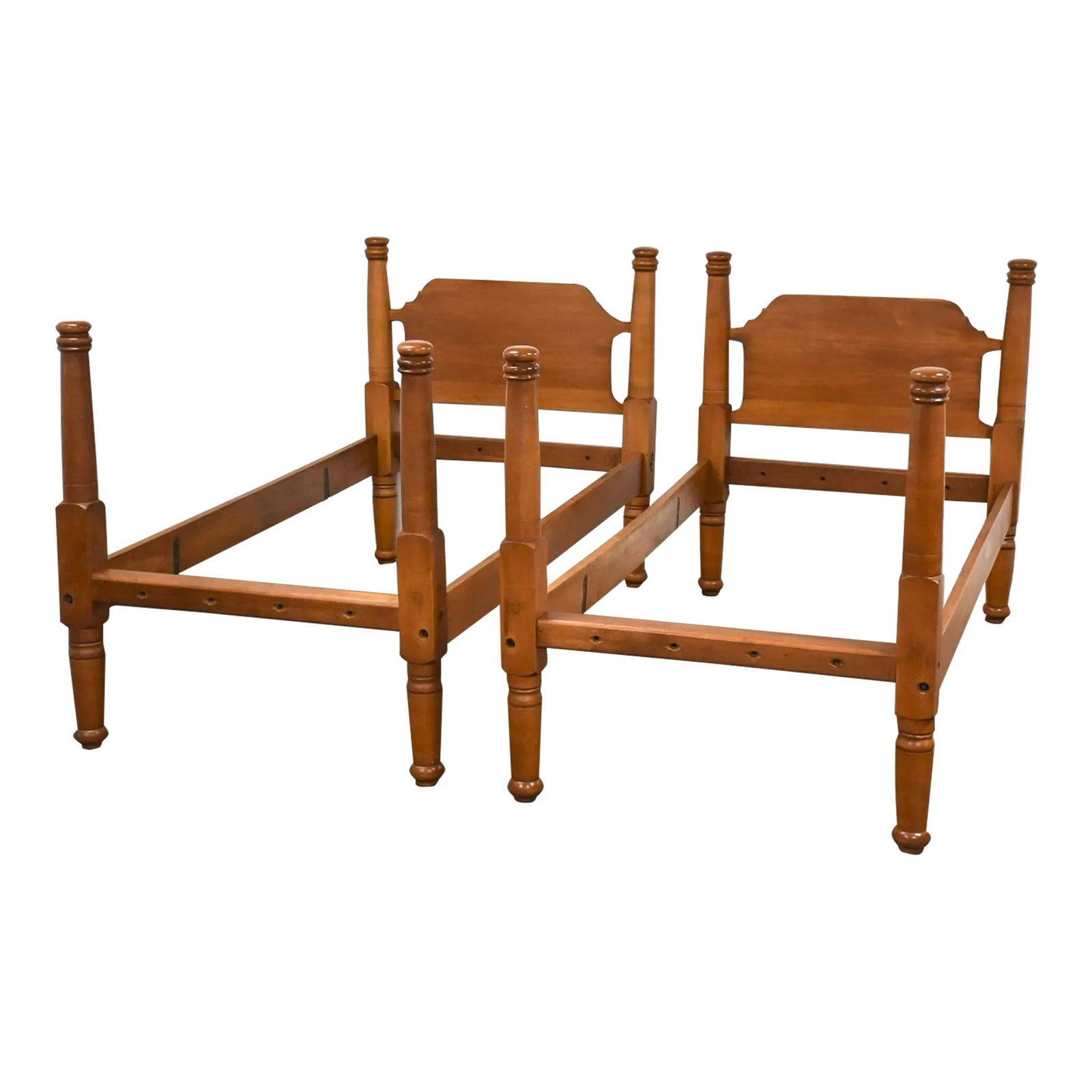 1960s Vintage Solid Maple Twin Beds Pair Classic Brown: 1960s Vintage Solid Maple Twin Beds Pair Classic Brown This pair of vintage maple twin beds from the 1960s showcases a timeless design and sturdy construction. Crafted from solid maple, these beds fea