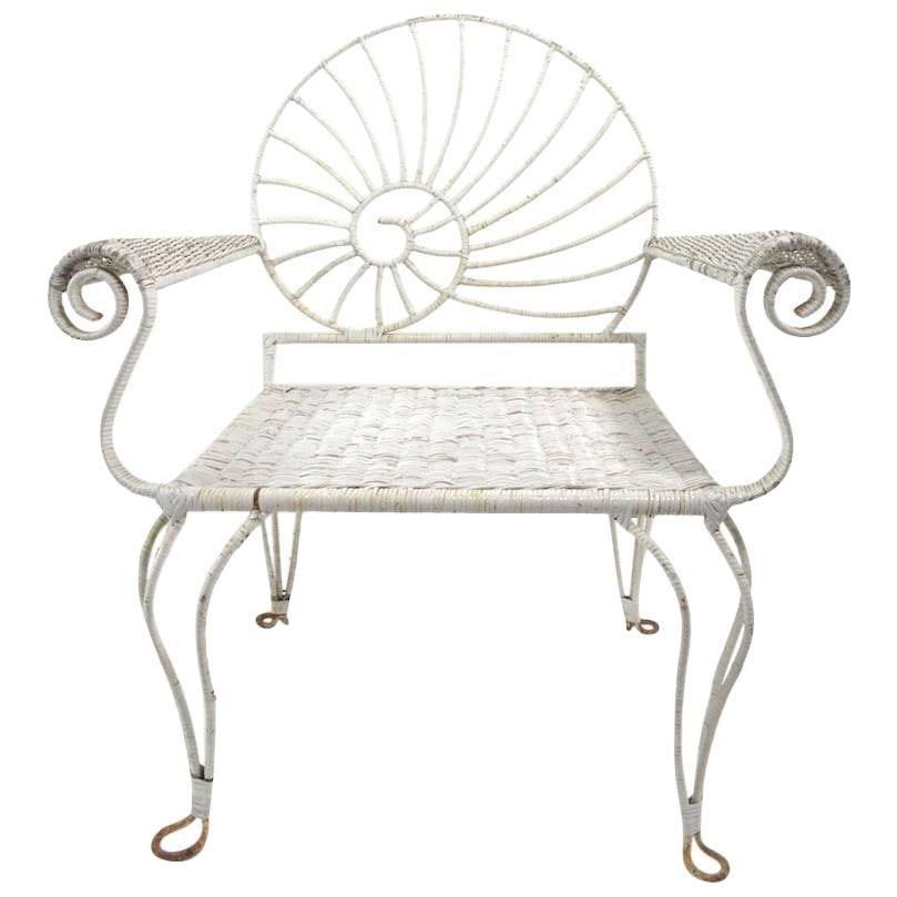Nautilus Shell Back Wicker Iron Lounge Chair in White: Nautilus Shell Back Wicker Iron Lounge Chair in White Elevate your living space with this stunning Nautilus Shell Back Arm Lounge Chair, expertly crafted from iron and wicker. The chair features a dur