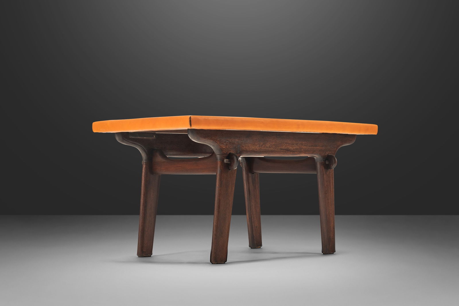 Mid-Century Modern Coffee Table by Angel Pazmino in Fruitwood and Cognac Leather: Mid-Century Modern Coffee Table by Angel Pazmino in Fruitwood and Cognac Leather Introducing this stunning Coffee Table / Side Table designed by Angel Pazmino, a remarkable piece crafted in Ecuador du