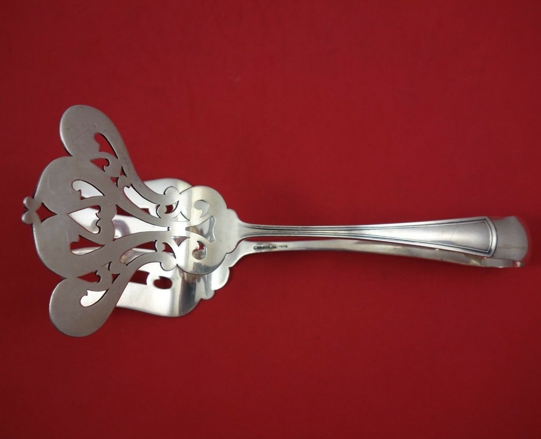 Dominick & Haff Virginia Sterling Silver Asparagus Tongs 9 1/4": Dominick & Haff Virginia Sterling Silver Asparagus Tongs 9 1/4" This exquisite set of asparagus serving tongs is crafted from sterling silver and features the elegant Virginia pattern by Dominick & Ha