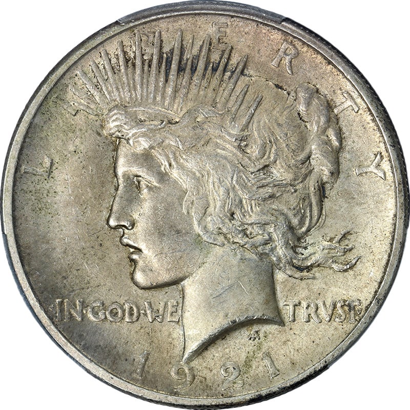 1921 Silver Peace Dollar High Relief PCGS MS63 Certified Uncirculated Coin: 1921 Silver Peace Dollar High Relief PCGS MS63 Certified Uncirculated Coin This 1921 Peace Dollar features a high relief design and is certified by PCGS with a grade of MS63. The coin is composed of s