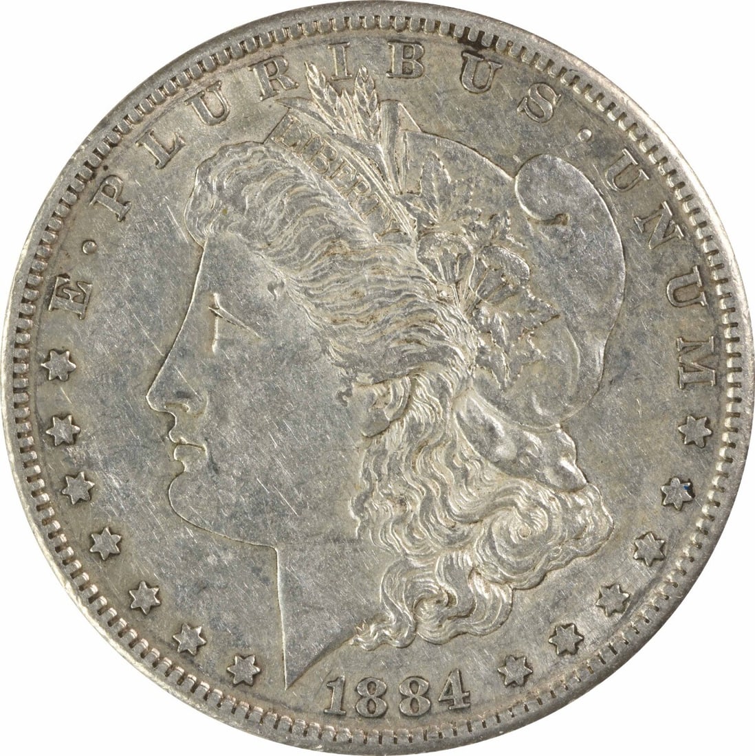 1884-S Morgan Silver Dollar AU Uncertified 90% Silver San Francisco: 1884-S Morgan Silver Dollar AU Uncertified 90% Silver San Francisco This 1884-S Morgan Silver Dollar features a beautiful design by George T. Morgan and is composed of 90% silver and 10% copper. The c