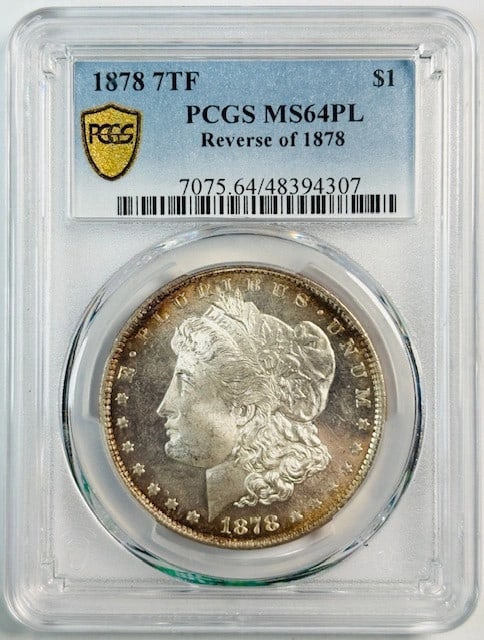 PCGS MS64 PL 1878 Morgan Dollar 7 Tail Feathers Reverse Silver Philadelphia: PCGS MS64 PL 1878 Morgan Dollar 7 Tail Feathers Reverse Silver Philadelphia This 1878 Morgan Silver Dollar features a 7 Tail Feathers, Reverse of 1878 design and is graded MS-64 Proof Like by PCGS.