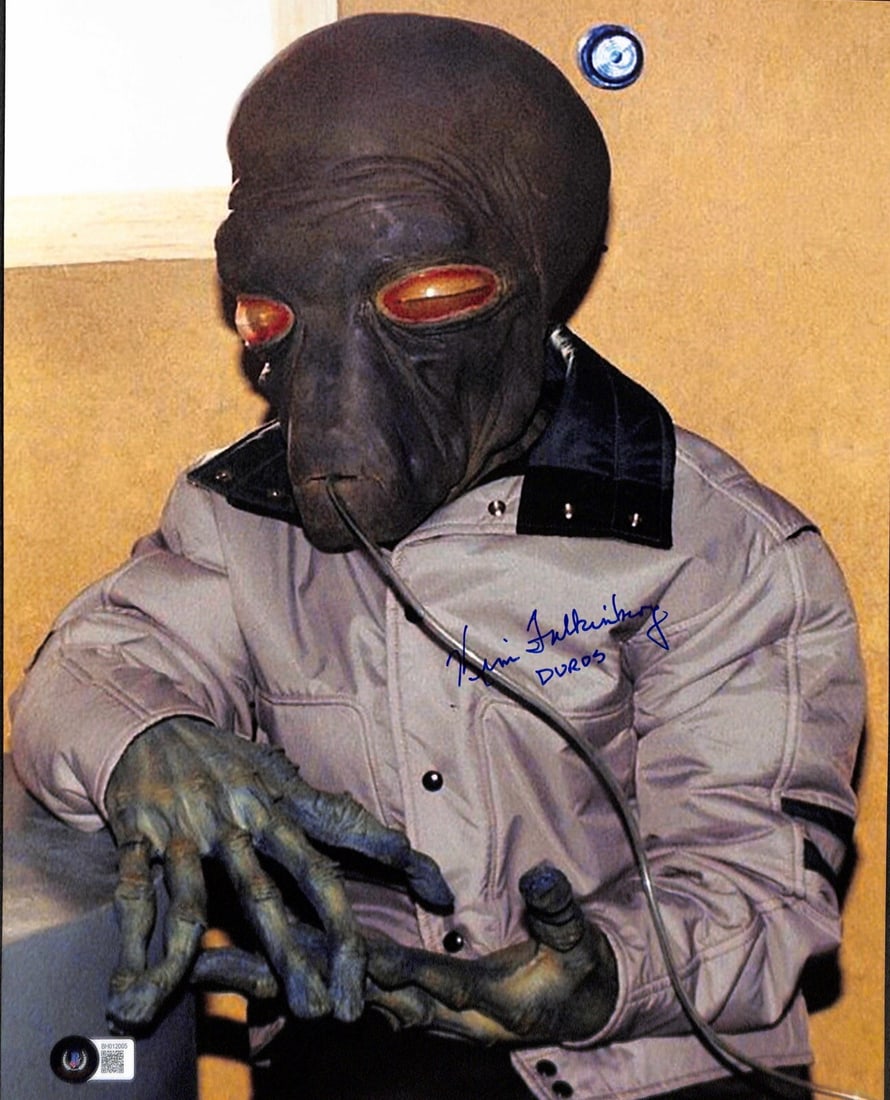 11x14 Star Wars Cantina Duros Autographed Photo by Kim Falkingburg Beckett Certified: 11x14 Star Wars Cantina Duros Autographed Photo by Kim Falkingburg Beckett Certified This is an original 11x14 photograph autographed by Kim Falkingburg, who portrayed a Duros in the cantina scene of