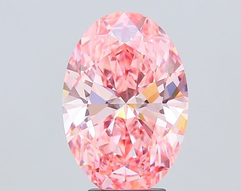 Loose Diamond - OVAL 5.07ct Fancy Vivid Pink VS1: Loose Diamond - OVAL 5.07ct Fancy Vivid Pink VS1 Source: This is a real non-mined Diamond that has been grown in a lab Shape: OVAL Carats: 5.07 Color: Fancy Vivid Pink Certification: IGI Video: