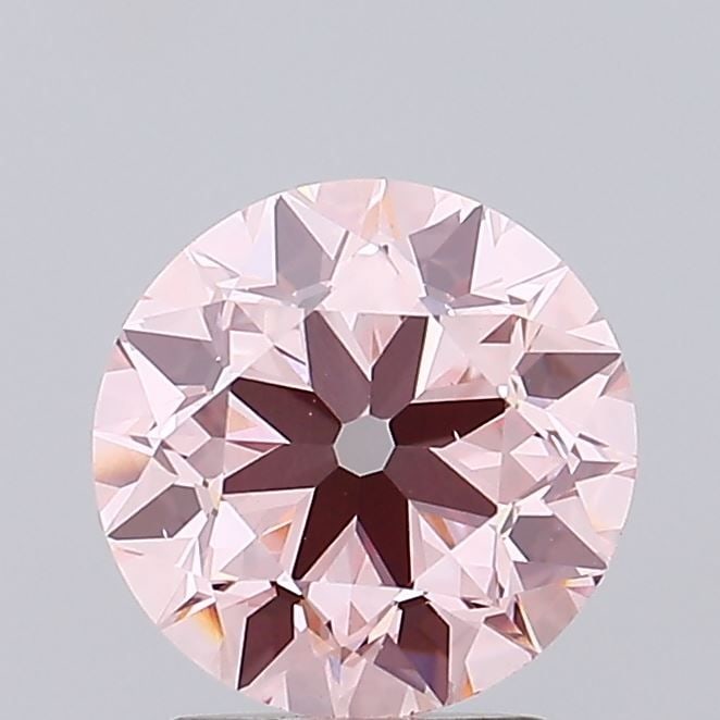 Loose Diamond - ROUND 1.94ct Fancy Vivid Pink VS1: Loose Diamond - ROUND 1.94ct Fancy Vivid Pink VS1 Source: This is a real non-mined Diamond that has been grown in a lab Shape: ROUND Carats: 1.94 Color: Fancy Vivid Pink Certification: IGI Video: