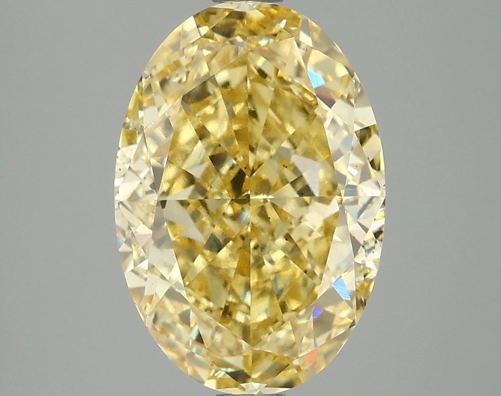 Loose Diamond - OVAL 4.07ct Fancy Vivid Yellow VS2: Loose Diamond - OVAL 4.07ct Fancy Vivid Yellow VS2 Source: This is a real non-mined Diamond that has been grown in a lab Shape: OVAL Carats: 4.07 Color: Fancy Vivid Yellow Certification: IGI Video: