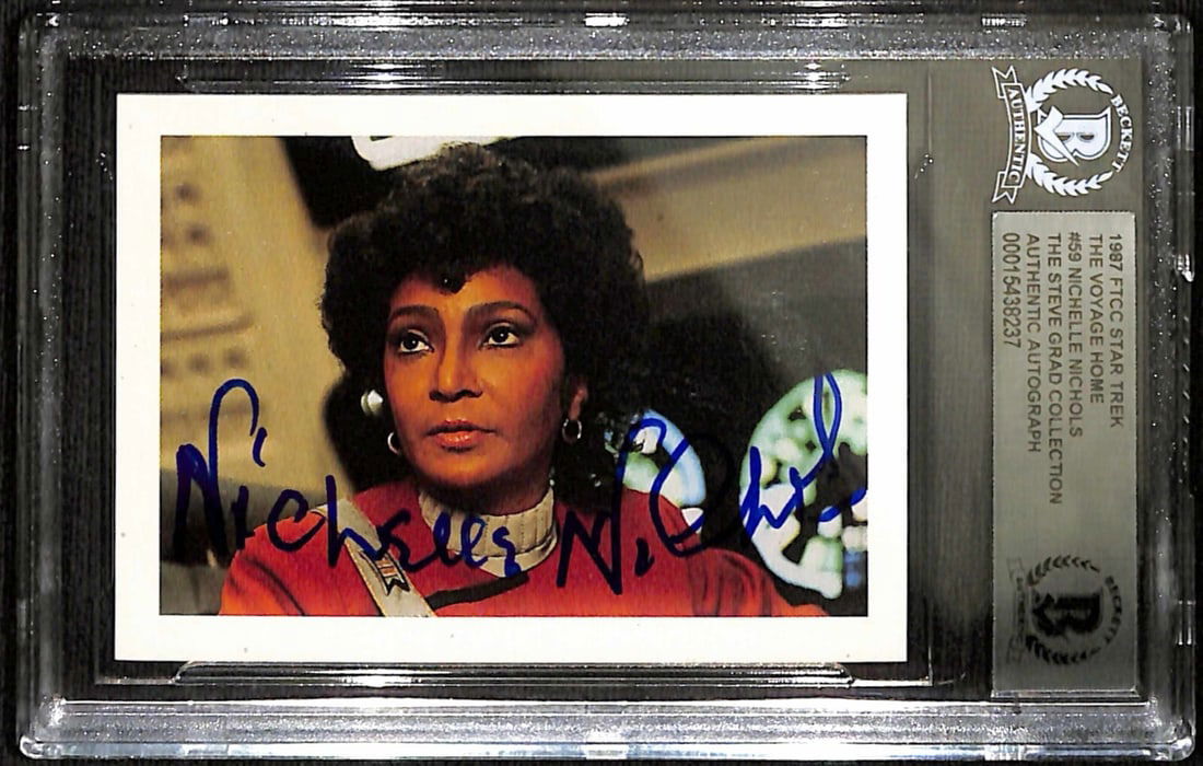 Nichelle Nichols Signed Star Trek III Trading Card #59 Beckett Authenticated: Nichelle Nichols Signed Star Trek III Trading Card #59 Beckett Authenticated This is a signed 1984 FTCC Star Trek III trading card featuring Nichelle Nichols, who portrayed Uhura in the film. The card