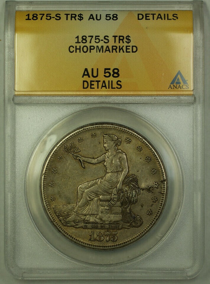 Chopmarked 1875-S Trade Dollar Silver Coin ANACS AU-58 Details: Chopmarked 1875-S Trade Dollar Silver Coin ANACS AU-58 Details This 1875-S Trade Silver Dollar is a chopmarked $1 coin from the United States, minted in San Francisco. Graded AU-58 Details by ANACS, i