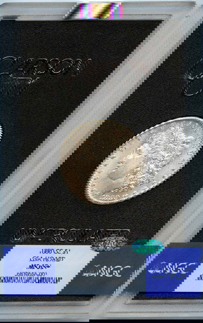 NGC MS65 Plus Carson City 1880 Morgan Dollar GSA Hoard CAC: NGC MS65 Plus Carson City 1880 Morgan Dollar GSA Hoard CAC This is an 1880-CC Morgan Dollar from the GSA Hoard, graded MS65+ by NGC with a CAC designation. Struck at the Carson City Mint, this uncircu