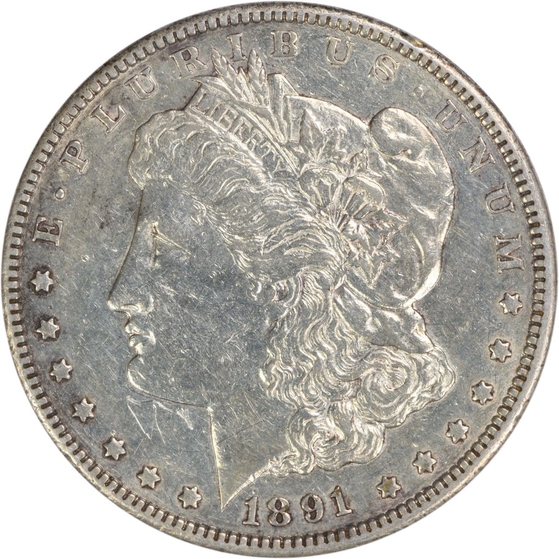 Carson City 1891 Morgan Dollar 90 Percent Silver Extra Fine Uncertified: Carson City 1891 Morgan Dollar 90 Percent Silver Extra Fine Uncertified This 1891-CC Morgan Silver Dollar from the Carson City Mint features a composition of 90% silver and 10% copper. Designed by Geo