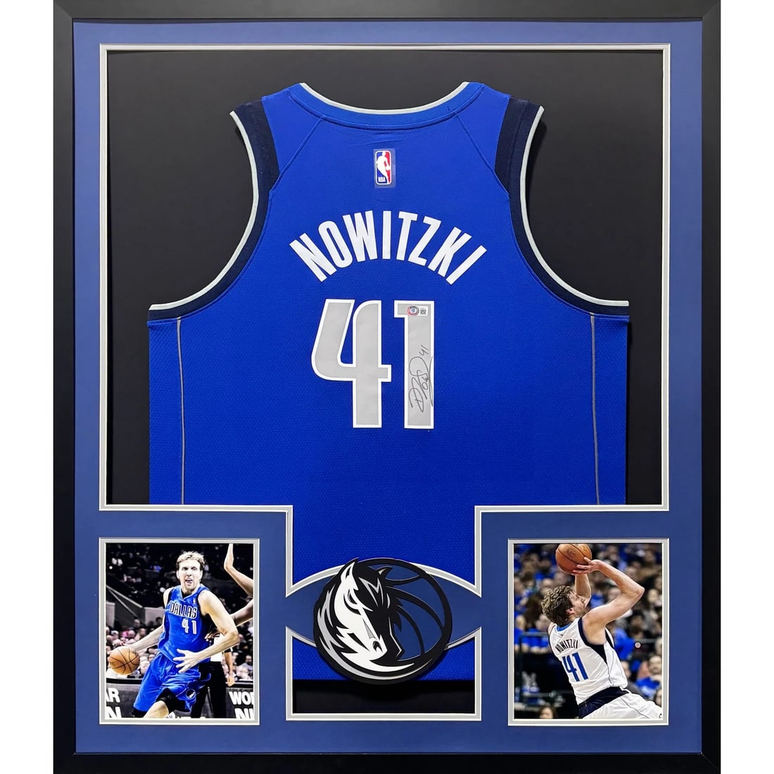 Framed Dirk Nowitzki Signed Mavericks Jersey with Beckett Authentication: Framed Dirk Nowitzki Signed Mavericks Jersey with Beckett Authentication This Dallas Mavericks royal jersey is autographed by Dirk Nowitzki and comes professionally framed. The jersey is authenticated