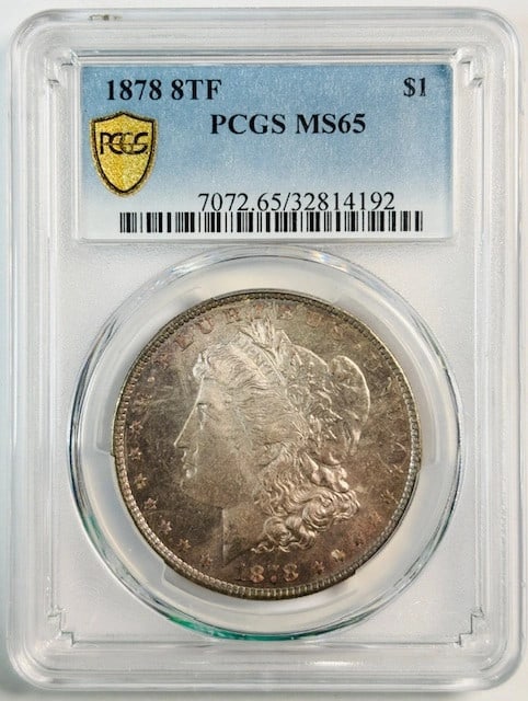 PCGS MS65 1878 Philadelphia Morgan Dollar 8 Tail Feathers Silver Coin: PCGS MS65 1878 Philadelphia Morgan Dollar 8 Tail Feathers Silver Coin This 1878 Morgan Silver Dollar features the 8 Tail Feathers variety and has been graded MS-65 by PCGS. Struck at the Philadelphia