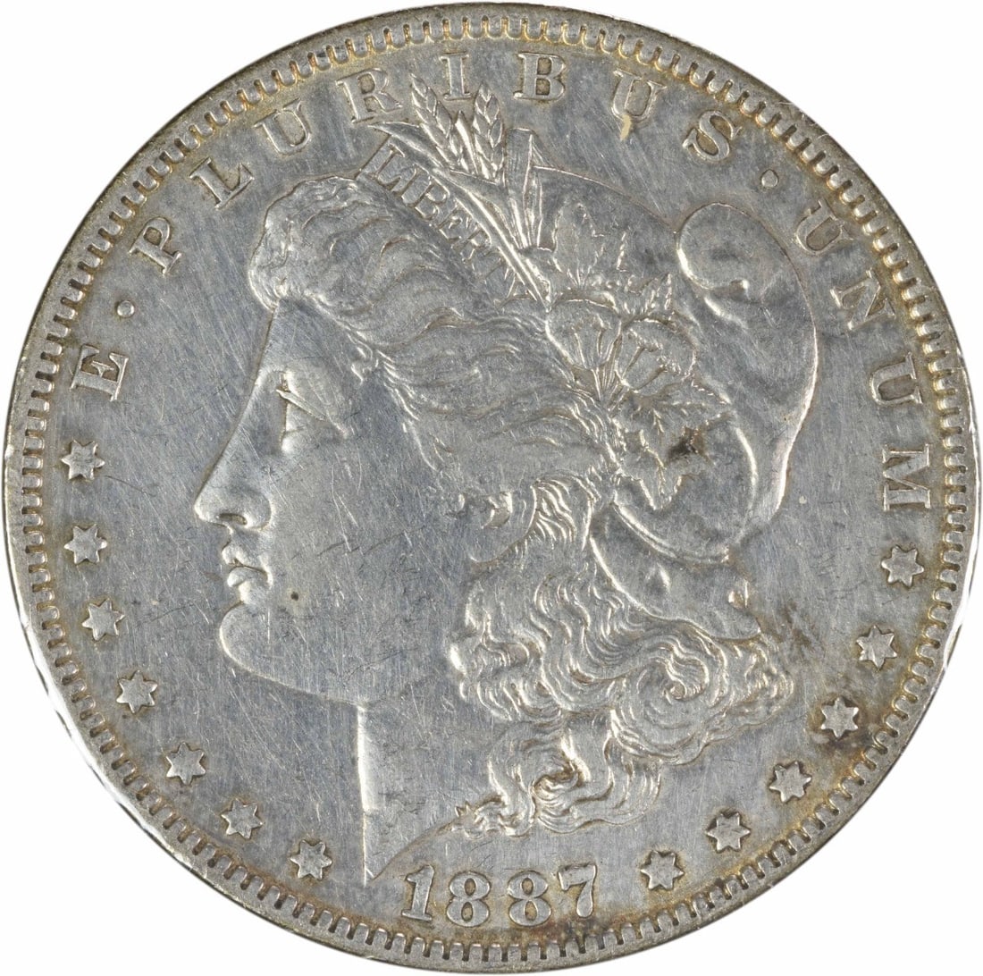 1887-O Morgan Silver Dollar VAM 2 by George T. Morgan: 1887-O Morgan Silver Dollar VAM 2 by George T. Morgan This 1887-O Morgan Silver Dollar, featuring the iconic design by George T. Morgan, is a fine addition to any collection. With a composition of 90%