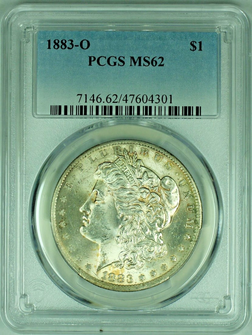 PCGS MS62 1883-O Morgan Dollar Silver Uncirculated $1 Coin: PCGS MS62 1883-O Morgan Dollar Silver Uncirculated $1 Coin This is an 1883-O Morgan Silver Dollar graded MS 62 by PCGS. The coin is uncirculated and composed of silver, originating from the United Sta