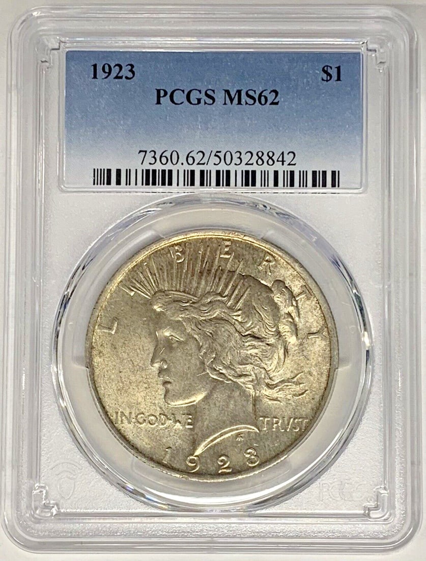 PCGS MS 62 1923 Peace Dollar Silver Coin Light Toning: PCGS MS 62 1923 Peace Dollar Silver Coin Light Toning This is a 1923 Peace Silver Dollar coin from the United States, lightly toned and graded MS 62 by PCGS. The coin is uncirculated and composed of s