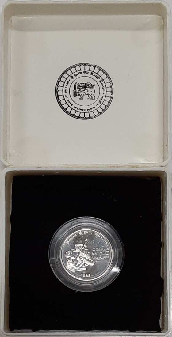 1999 Sri Lanka 1 Rupee Army 50th Anniversary Prooflike Coin in OGP with COA: 1999 Sri Lanka 1 Rupee Army 50th Anniversary Prooflike Coin in OGP with COA This 1999 Sri Lanka 1 Rupee proof-like coin was issued to commemorate the 50th anniversary of the Sri Lankan Army. The coin