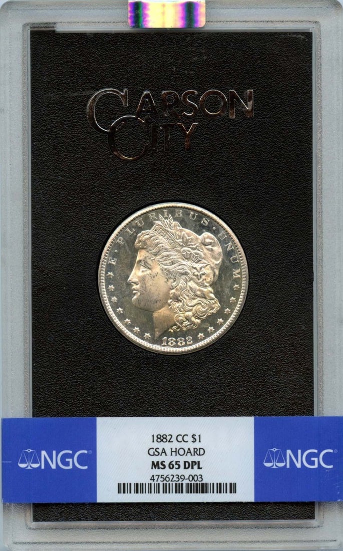 NGC MS65DMPL GSA Hoard 1882 Carson City Morgan Silver Dollar: NGC MS65DMPL GSA Hoard 1882 Carson City Morgan Silver Dollar This is an 1882-CC Morgan Dollar from the GSA Hoard, certified by NGC with a grade of MS65DMPL. The coin is uncirculated and originates