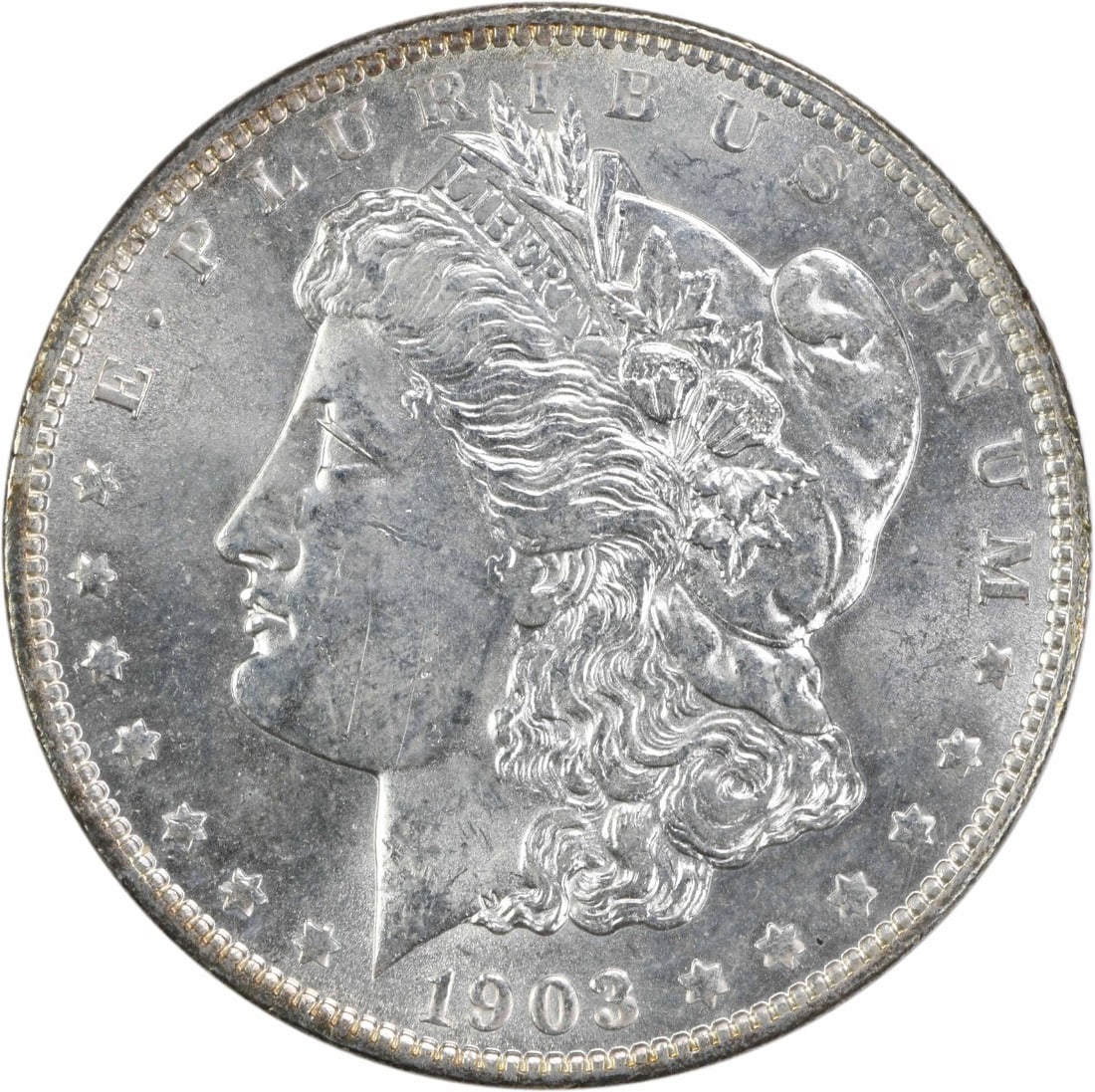 1903-O Morgan Silver Dollar Choice BU Uncertified Coin: 1903-O Morgan Silver Dollar Choice BU Uncertified Coin This 1903-O Morgan Silver Dollar is a stunning example of American coinage, featuring a beautiful choice Brilliant Uncirculated (BU) grade. It sh