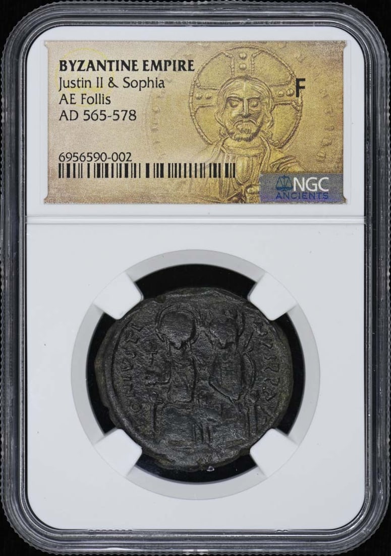 Byzantine Empire AE Follis Coin of Justin II and Sophia NGC F12: Byzantine Empire AE Follis Coin of Justin II and Sophia NGC F12 This is a Byzantine Empire AE Follis, also referred to as a 40 Nummi coin, issued during the reign of Justin II and Sophia. The coin has