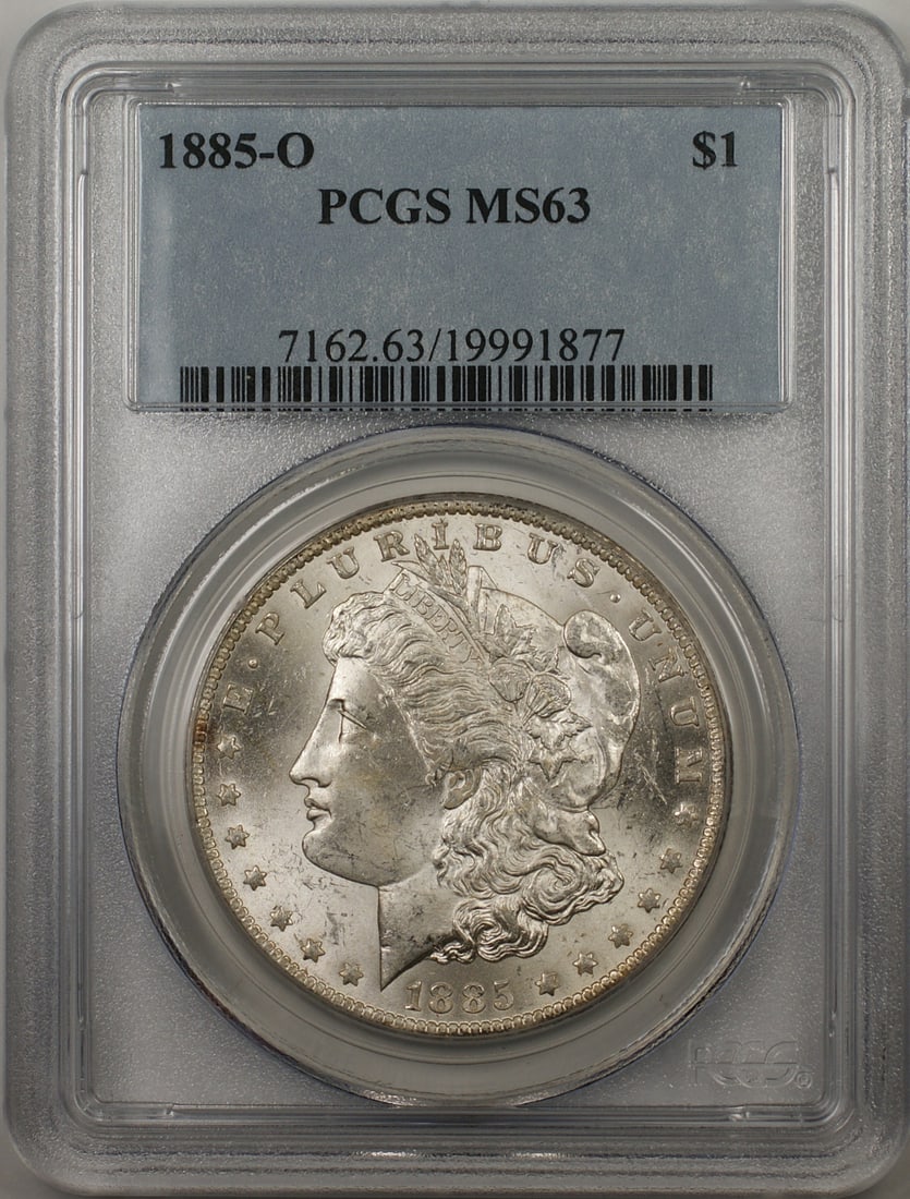 PCGS MS 63 1885-O Morgan Silver Dollar Coin Uncirculated New Orleans Mint: PCGS MS 63 1885-O Morgan Silver Dollar Coin Uncirculated New Orleans Mint This is an 1885-O Morgan Silver Dollar with a denomination of $1, graded MS 63 by PCGS. Struck in New Orleans, the coin is com