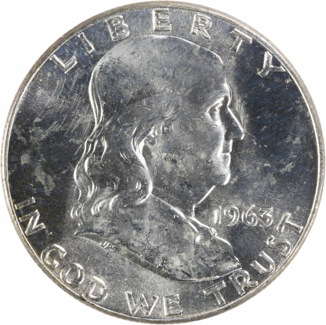 Uncirculated 1963 Silver 50C Franklin Half Dollar Choice Brilliant Uncertified: Uncirculated 1963 Silver 50C Franklin Half Dollar Choice Brilliant Uncertified This is a 1963 Franklin silver half dollar coin in uncirculated condition, graded as Choice BU. The coin is uncertified,