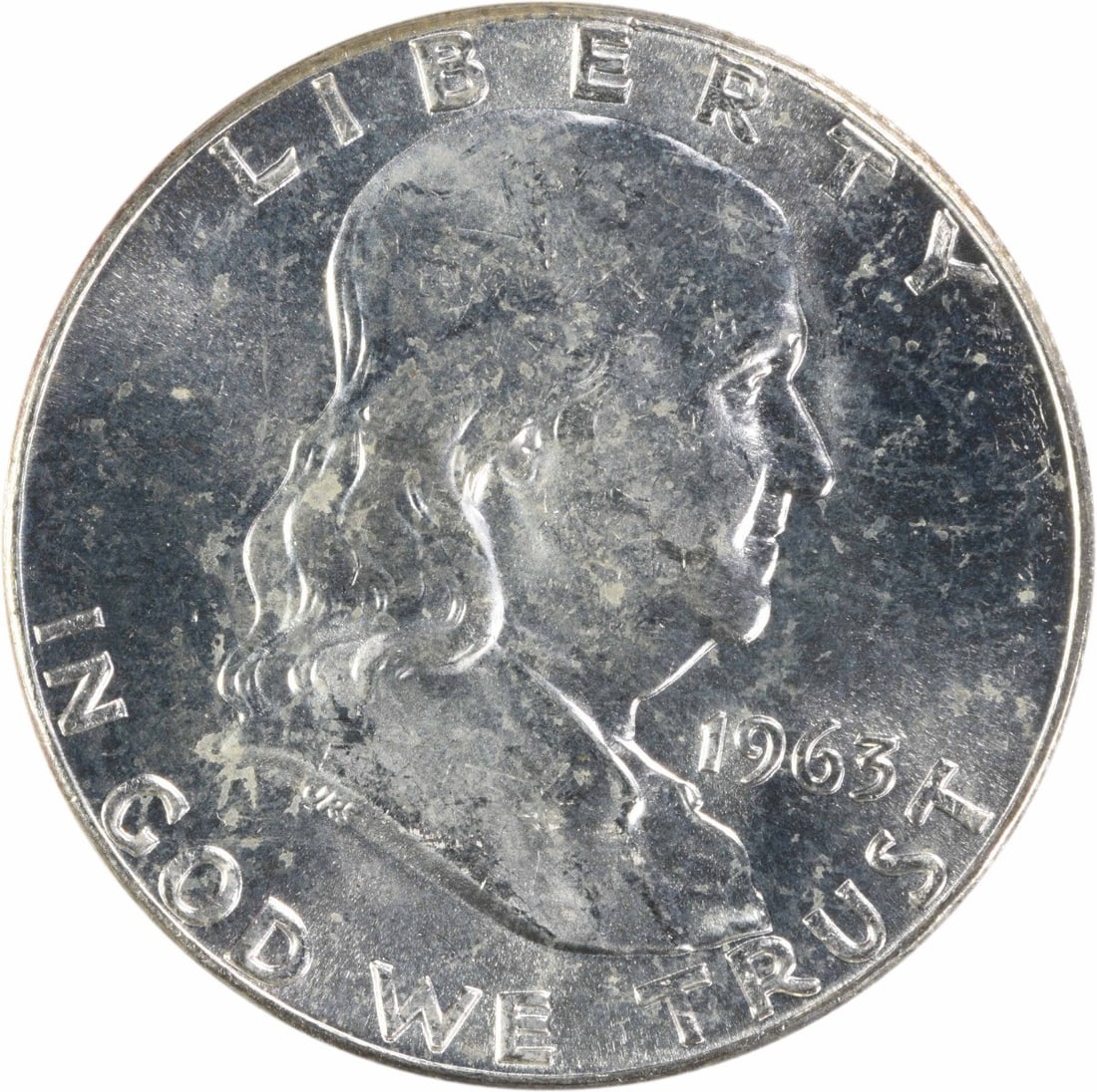 Uncertified 1963 Silver 50 Cent Franklin Half Dollar Choice Brilliant Uncirculated: Uncertified 1963 Silver 50 Cent Franklin Half Dollar Choice Brilliant Uncirculated This 1963 Franklin Half Dollar is composed of silver and remains in uncirculated condition, graded as Choice BU. The