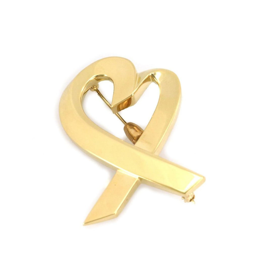 Tiffany & Co. Paloma Picasso 18k Yellow Gold Loving Heart Pendant and Chain: Tiffany & Co. Paloma Picasso 18k Yellow Gold Loving Heart Pendant and Chain This exquisite large pendant and chain from Tiffany & Co. features the iconic Loving Heart design by Paloma Picasso. Crafted
