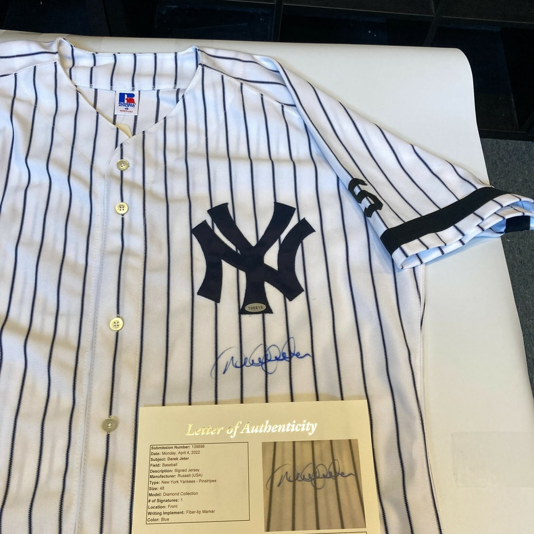 Derek Jeter Signed 1999 Yankees Jersey with JSA COA and Dimaggio Patch: Derek Jeter Signed 1999 Yankees Jersey with JSA COA and Dimaggio Patch This authentic 1999 New York Yankees Game Model Jersey is signed by baseball legend Derek Jeter and features the Joe DiMaggio Mem
