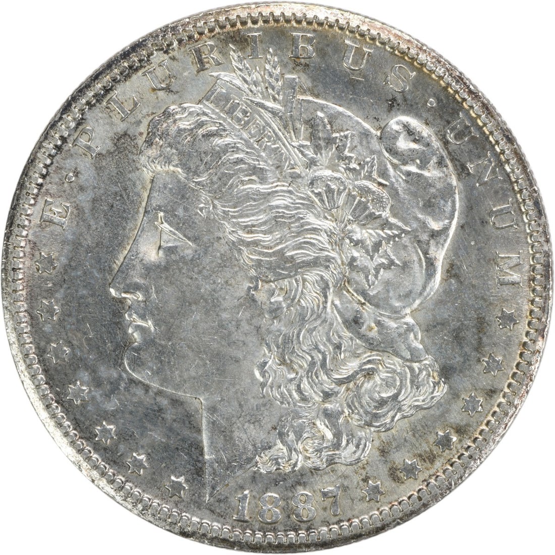 1887-S Morgan Silver Dollar AU Uncertified George T Morgan Design: 1887-S Morgan Silver Dollar AU Uncertified George T Morgan Design This 1887-S Morgan Silver Dollar is a stunning example of American coinage, featuring the renowned design by George T. Morgan. The coi