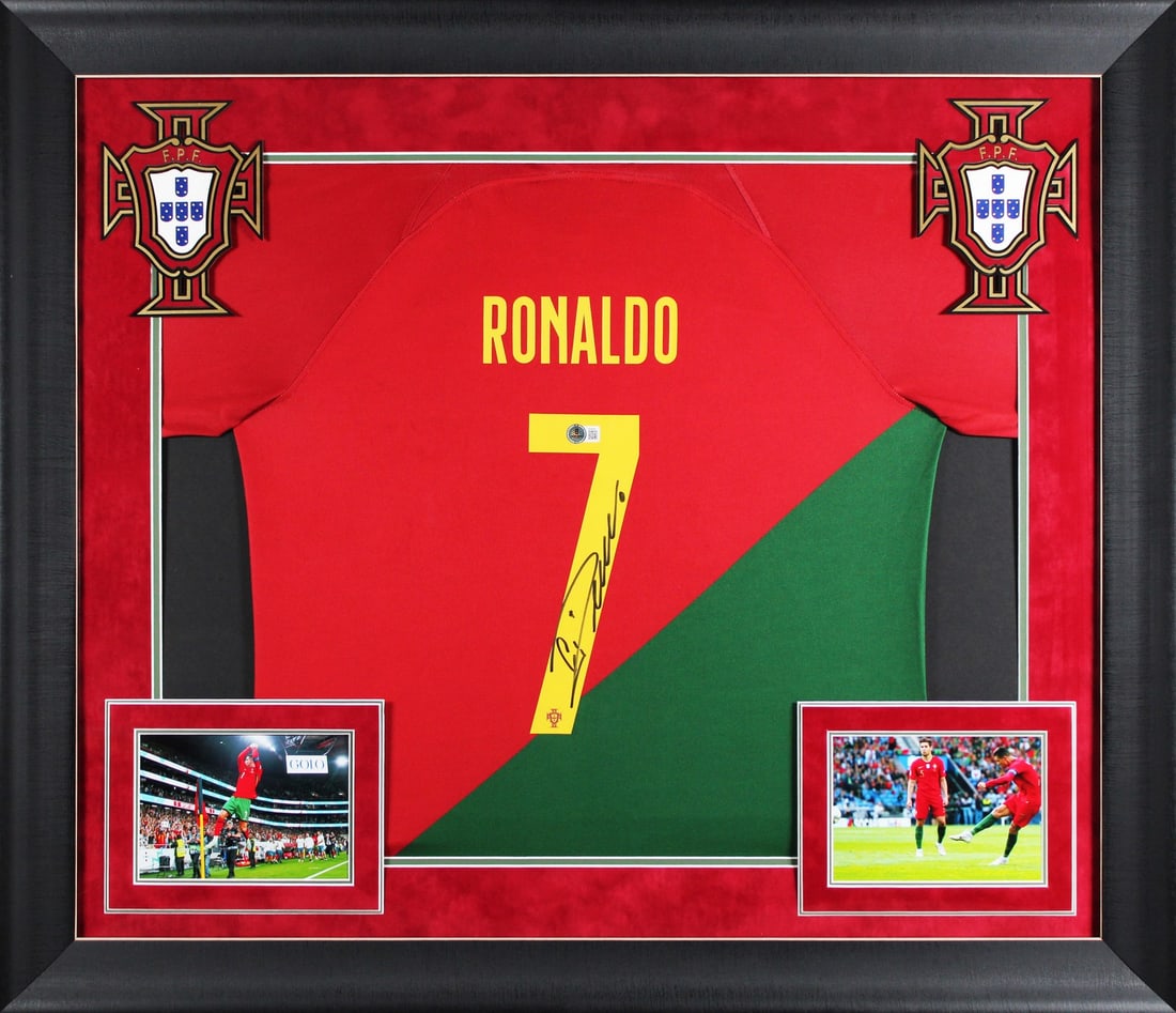 Framed Portugal Red Nike Jersey Signed by Cristiano Ronaldo Beckett Authenticated: Framed Portugal Red Nike Jersey Signed by Cristiano Ronaldo Beckett Authenticated This framed red Nike Portugal jersey has been personally signed by Cristiano Ronaldo. The autograph is authenticated b