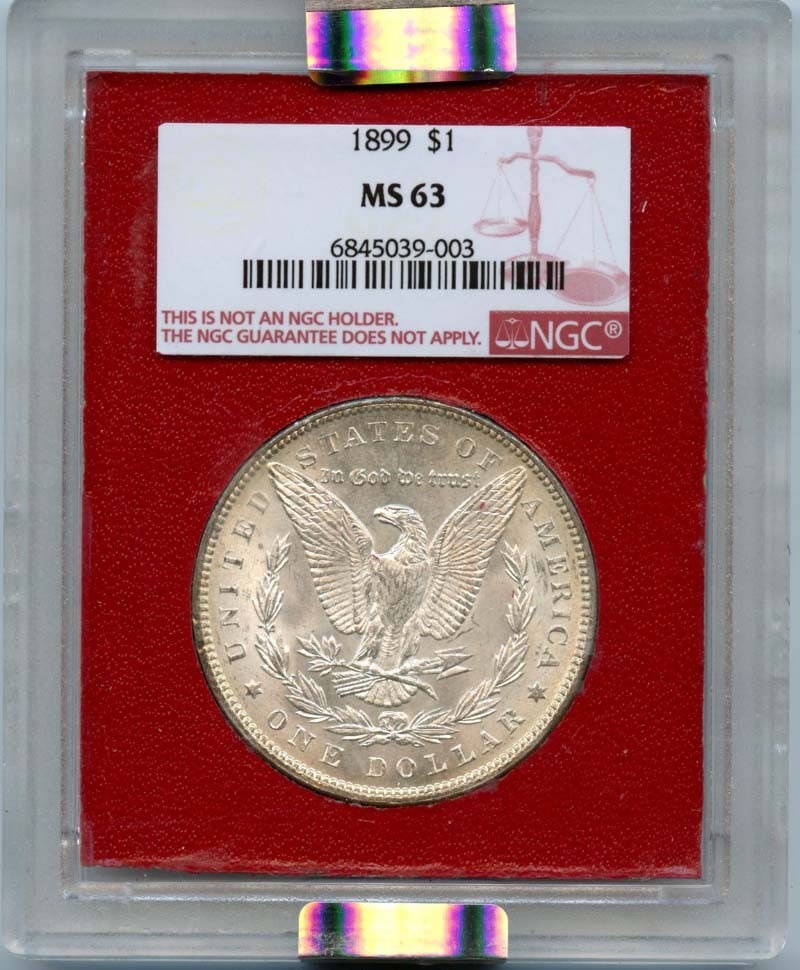 1899 Morgan Dollar S$1 NGC MS63 Uncirculated Philadelphia: 1899 Morgan Dollar S$1 NGC MS63 Uncirculated Philadelphia This 1899 Morgan Dollar, graded MS63 by NGC, is a remarkable piece of numismatic history. Struck at the Philadelphia Mint, this uncirculated s
