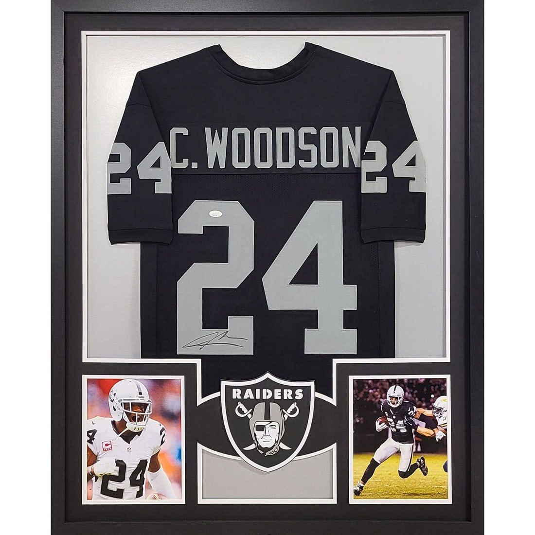 Charles Woodson Autographed Framed Jersey JSA Certified Raiders: Charles Woodson Autographed Framed Jersey JSA Certified Raiders This is an autographed jersey of Charles Woodson, beautifully framed and authenticated by JSA, a leader in sports memorabilia verificati