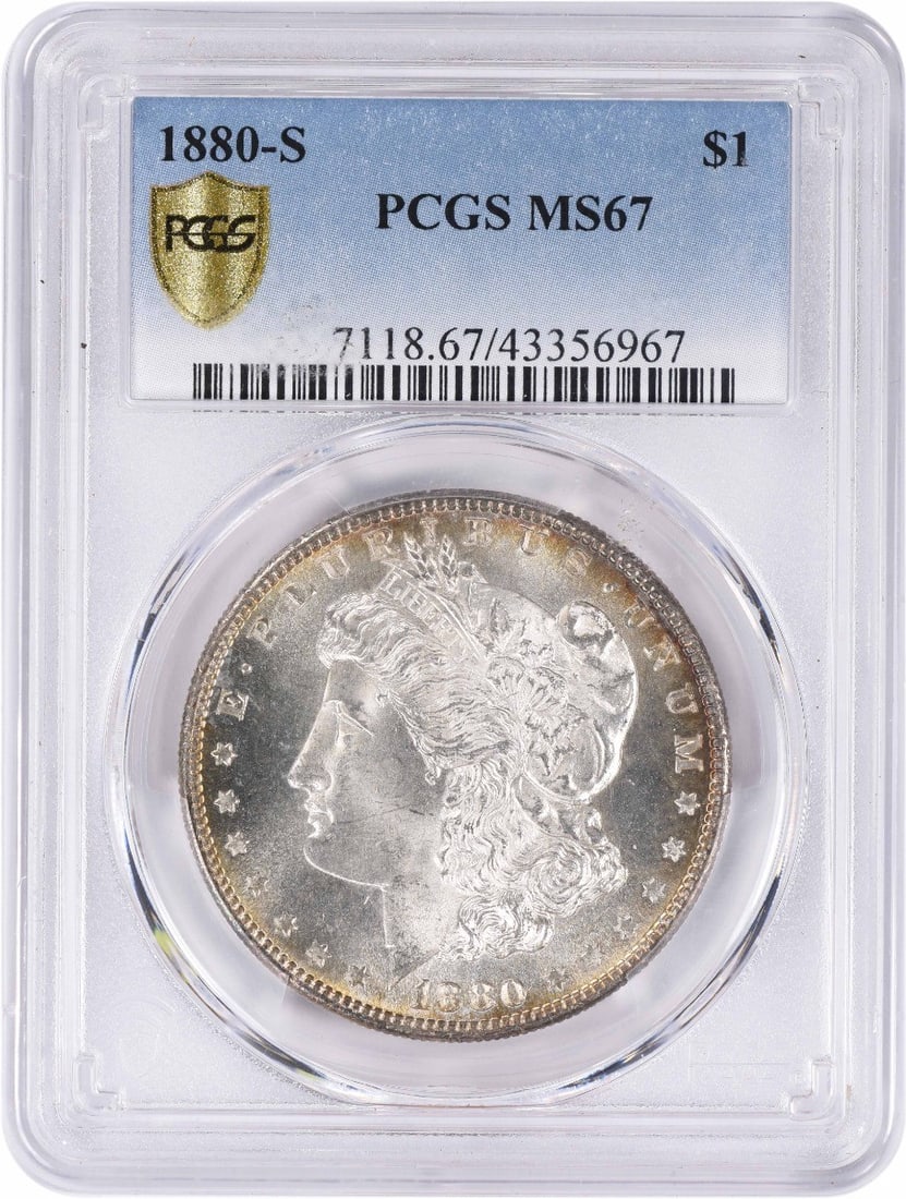 MS67 Graded 1880 San Francisco Morgan Silver Dollar by PCGS: MS67 Graded 1880 San Francisco Morgan Silver Dollar by PCGS This is an 1880-S Morgan Silver Dollar graded MS67 by PCGS. Struck at the San Francisco Mint, this uncirculated coin is composed of 90% silv