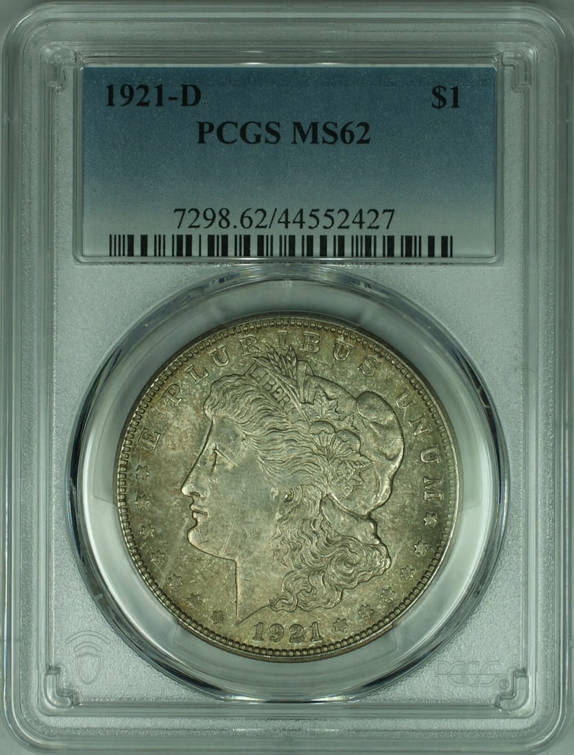 PCGS MS-62 1921-D Morgan Dollar Silver Coin with Toning: PCGS MS-62 1921-D Morgan Dollar Silver Coin with Toning This is a 1921-D Morgan Silver Dollar coin graded MS-62 by PCGS. The coin was minted in Denver and features natural toning. It is composed of si