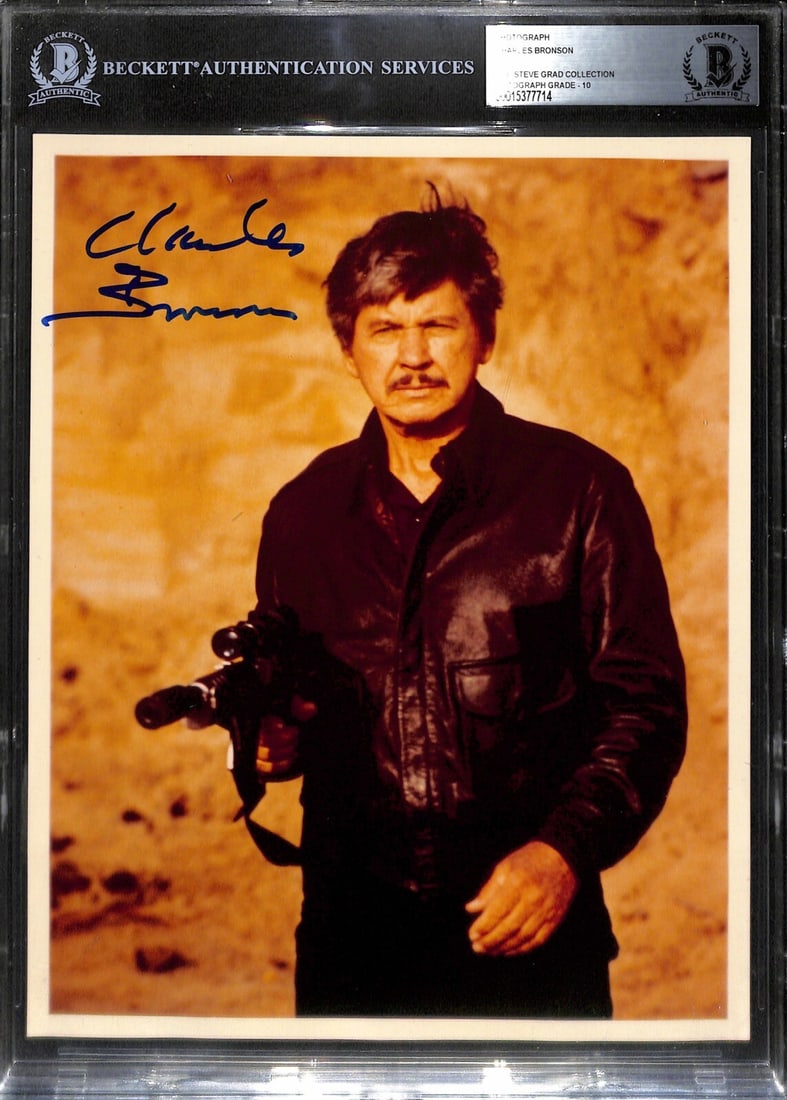 8x10 Autographed Photo of Charles Bronson from Death Wish Graded 10 by Beckett: 8x10 Autographed Photo of Charles Bronson from Death Wish Graded 10 by Beckett This is an original 8x10 photograph signed by actor Charles Bronson in blue permanent marker. The autograph has been auth