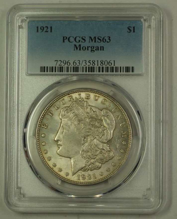 PCGS MS-63 1921 Morgan Dollar Silver Coin Lightly Toned Philadelphia Mint: PCGS MS-63 1921 Morgan Dollar Silver Coin Lightly Toned Philadelphia Mint This 1921 US Morgan Silver Dollar is certified by PCGS with a grade of MS-63 and features a lightly toned finish. Minted in Ph