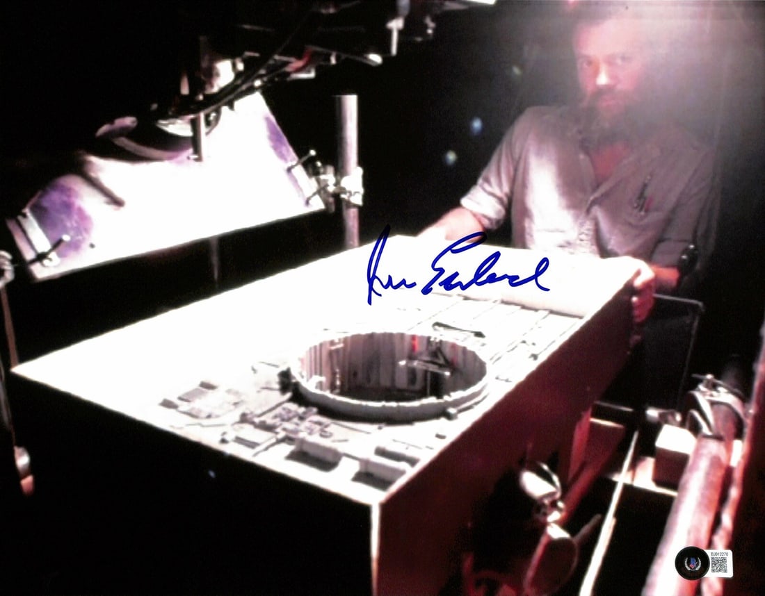 11x14 Death Star Exhaust Port Photo Signed by Jonathan Erland Beckett Authenticated: 11x14 Death Star Exhaust Port Photo Signed by Jonathan Erland Beckett Authenticated This 11x14 photograph features the Death Star exhaust port and is hand-signed in blue permanent marker by Jonathan E