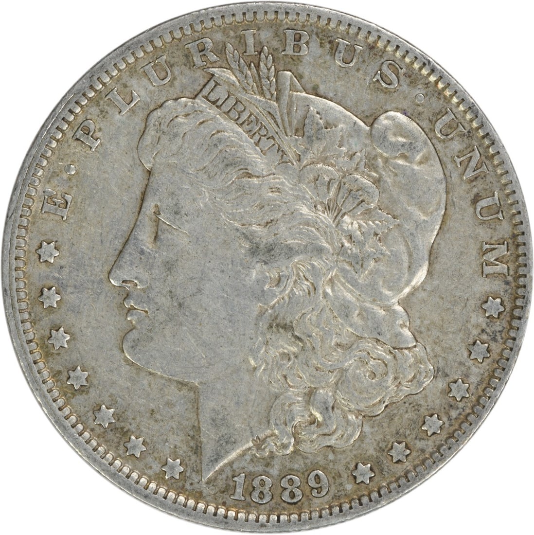 1889-O Morgan Silver Dollar EF Uncertified 90% Silver Coin: 1889-O Morgan Silver Dollar EF Uncertified 90% Silver Coin This 1889-O Morgan Silver Dollar is a classic piece of American numismatics. Struck in 90% silver and 10% copper, this coin showcases the tim
