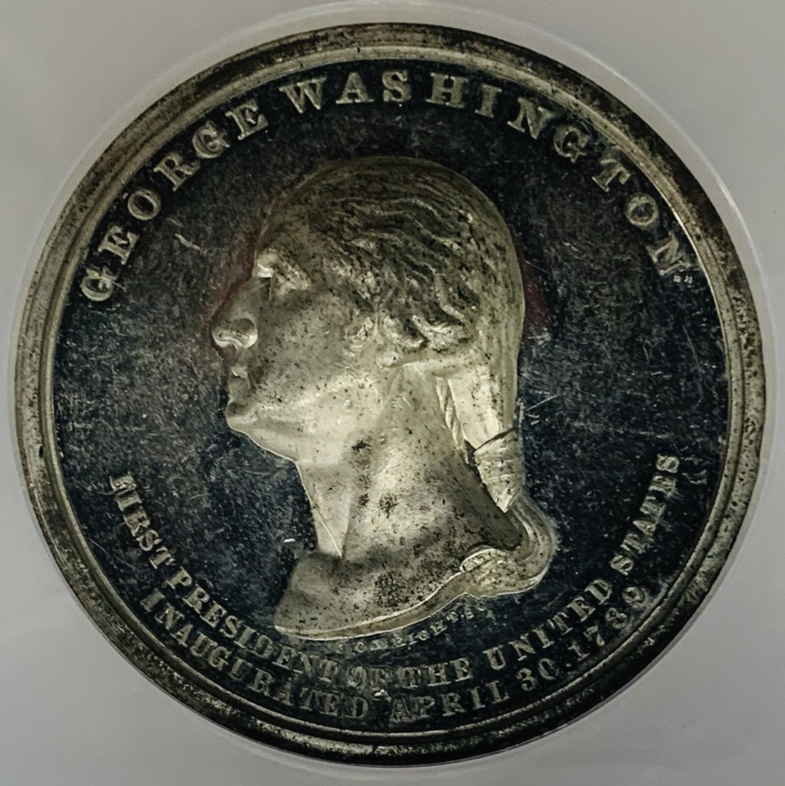 Uncirculated 1889 White Metal Inauguration Centennial Medal GW-187 NGC Proof: Uncirculated 1889 White Metal Inauguration Centennial Medal GW-187 NGC Proof This 1889 GW-187 WM 13 Links Inauguration Centennial Proof medal was issued by the U.S. Mint to commemorate the centennial