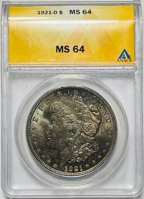 1921 D Morgan Silver Dollar ANACS MS 64 Uncirculated Coin: 1921 D Morgan Silver Dollar ANACS MS 64 Uncirculated Coin This 1921 D Morgan Silver Dollar is certified by ANACS with a grade of MS 64, indicating it is in uncirculated condition. Minted in Denver, th