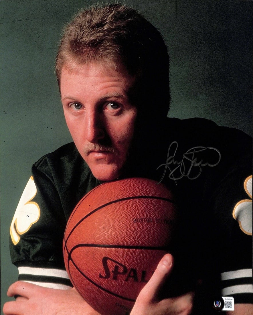 Larry Bird Autographed 11x14 Photo Beckett Certified: Larry Bird Autographed 11x14 Photo Beckett Certified This is an original autographed 11x14 photograph of basketball legend Larry Bird, signed in silver permanent marker. The autograph comes with authe