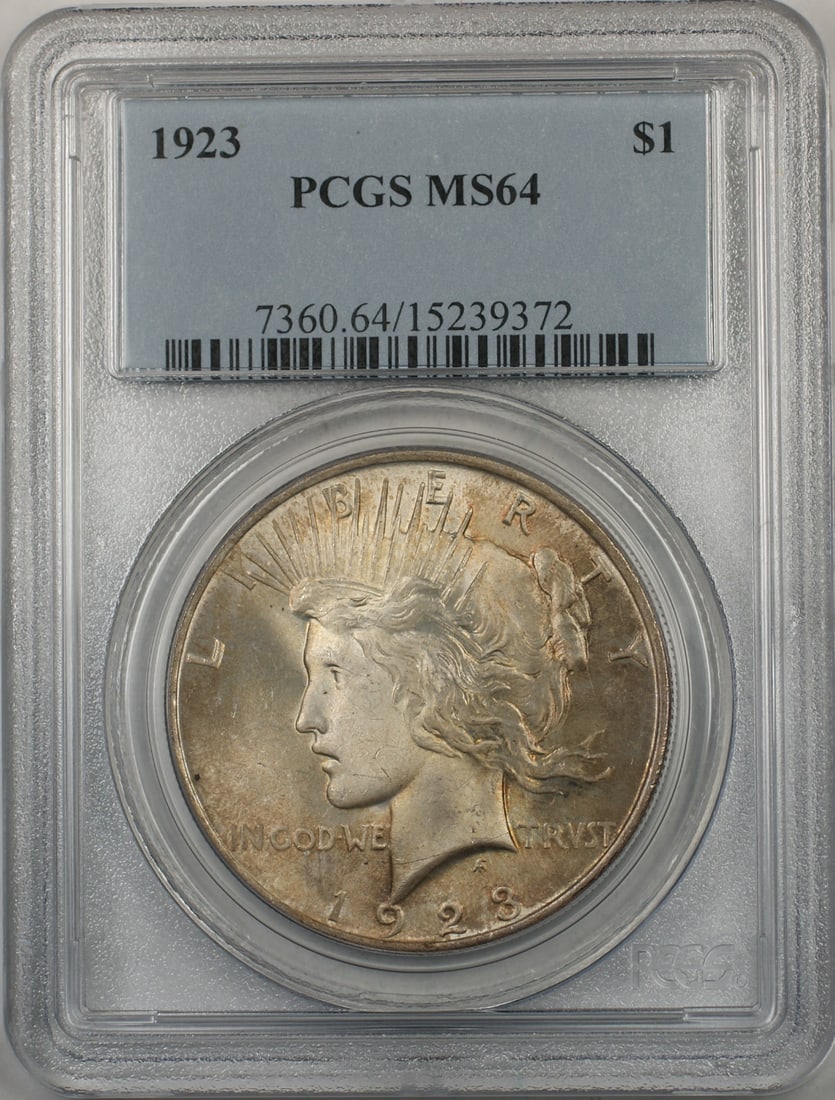 PCGS MS64 1923 Peace Silver Dollar Philadelphia Toned Uncirculated Coin: PCGS MS64 1923 Peace Silver Dollar Philadelphia Toned Uncirculated Coin This 1923 Silver Peace Dollar is graded MS-64 by PCGS and features attractive natural toning. Struck in Philadelphia, this uncir