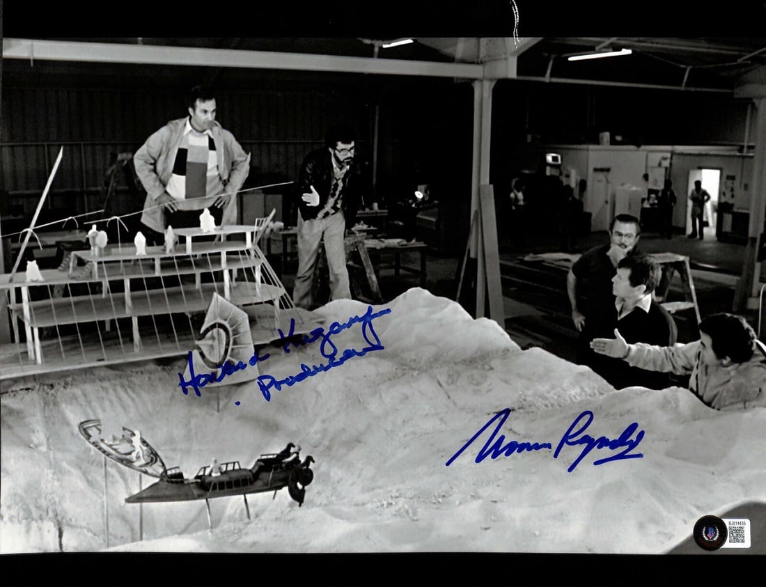 Howard Kazanjian Norman Reynolds Signed 11x14 Star Wars Photo Beckett Certified: Howard Kazanjian Norman Reynolds Signed 11x14 Star Wars Photo Beckett Certified This is an autographed 11x14 color photograph from Star Wars: Return of the Jedi, signed in blue permanent marker by How