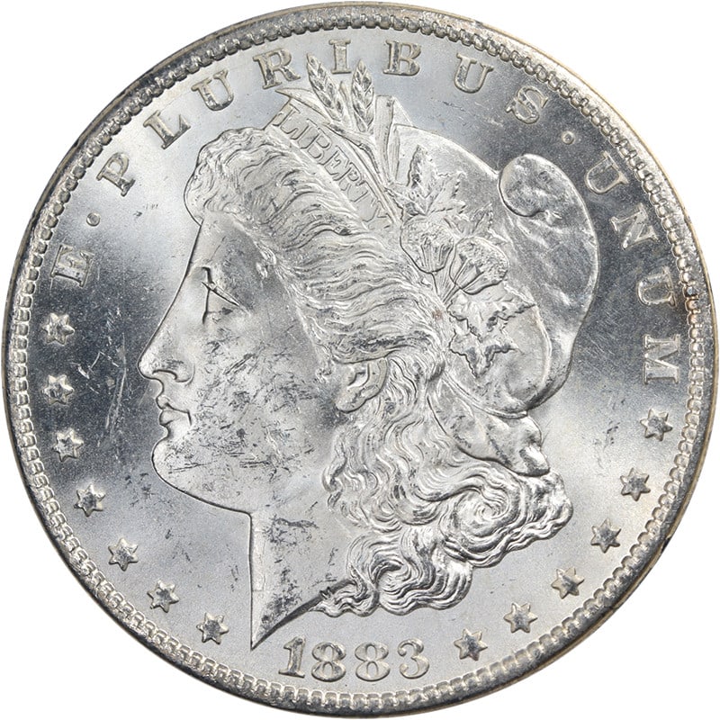 NGC MS63 1883-CC Morgan Dollar GSA Holder Uncirculated Silver Coin: NGC MS63 1883-CC Morgan Dollar GSA Holder Uncirculated Silver Coin This is an original 1883-CC GSA Morgan Silver Dollar, certified by NGC with a grade of MS63. The coin is uncirculated and features a