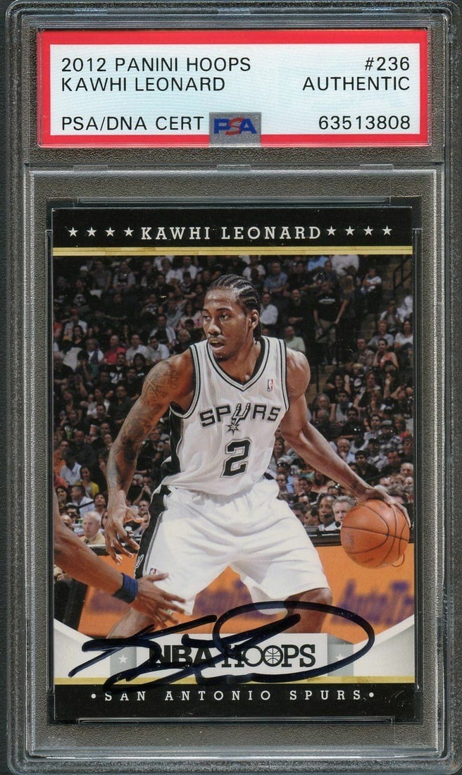 2012 Panini Hoops Kawhi Leonard Rookie Auto RC #236 PSA Authentic Spurs: 2012 Panini Hoops Kawhi Leonard Rookie Auto RC #236 PSA Authentic Spurs This is a 2012 Panini Hoops Rookie card #236 featuring an authentic autograph from NBA star Kawhi Leonard. This card showcases L