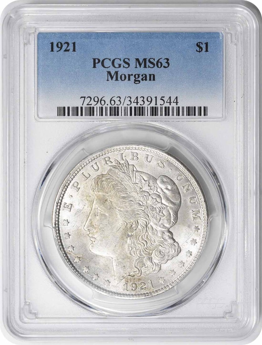 1921 Morgan Silver Dollar MS63 PCGS 90% Silver Uncirculated: 1921 Morgan Silver Dollar MS63 PCGS 90% Silver Uncirculated This 1921 Morgan Silver Dollar is a stunning example of numismatic craftsmanship, graded MS63 by PCGS, indicating it is in uncirculated cond